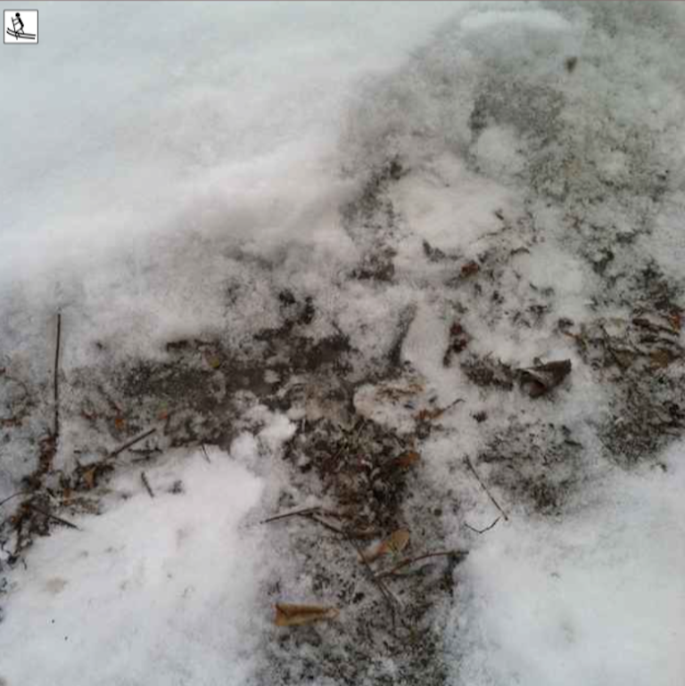 layer of ice beneath snow